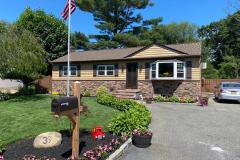 Kingwall Siding: Honey oak  American Harvest Roof: Saddlewood Ranch