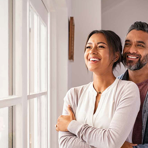 Family looking out King Quality Window